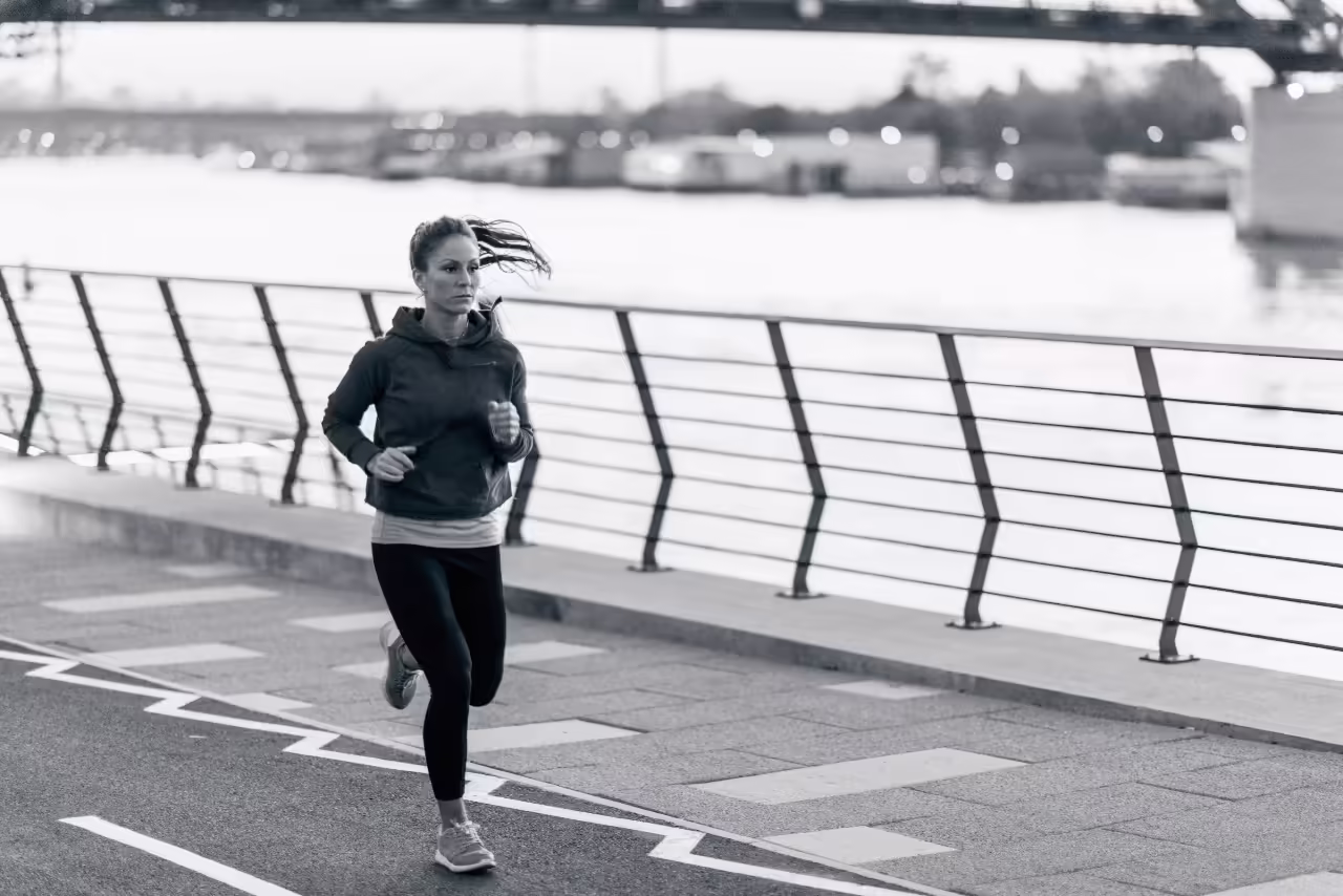 focused woman jogging in urban setting 2026 03 10 01 58 34 utc